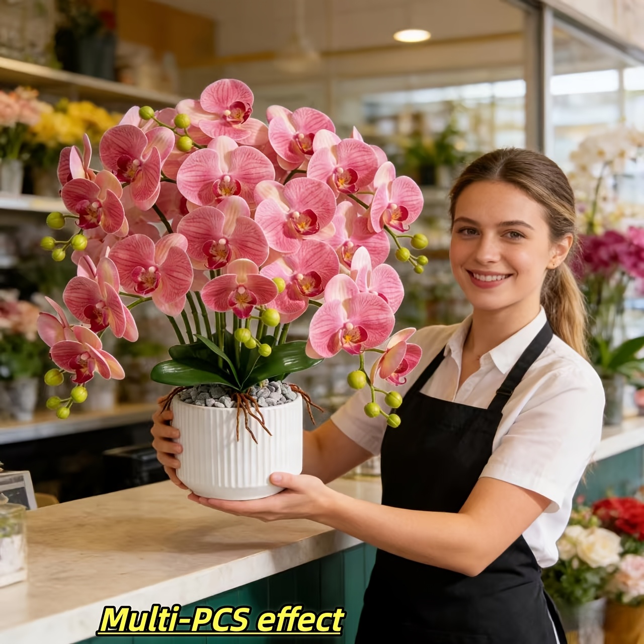 A Pot of White Potted Artificial Orchids